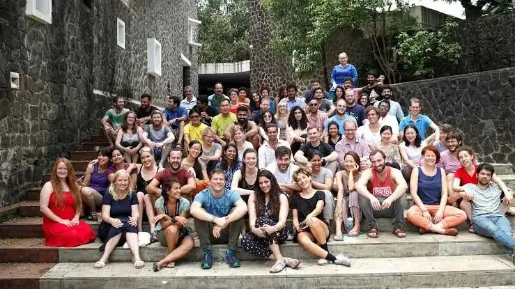 A large group of MUWCI students on the campus steps